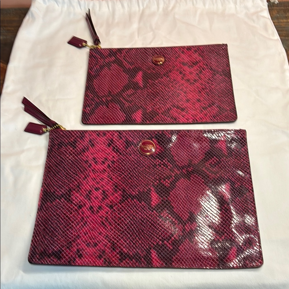 EUC Raspberry Snakeskin Tech Pouches with gold hardware